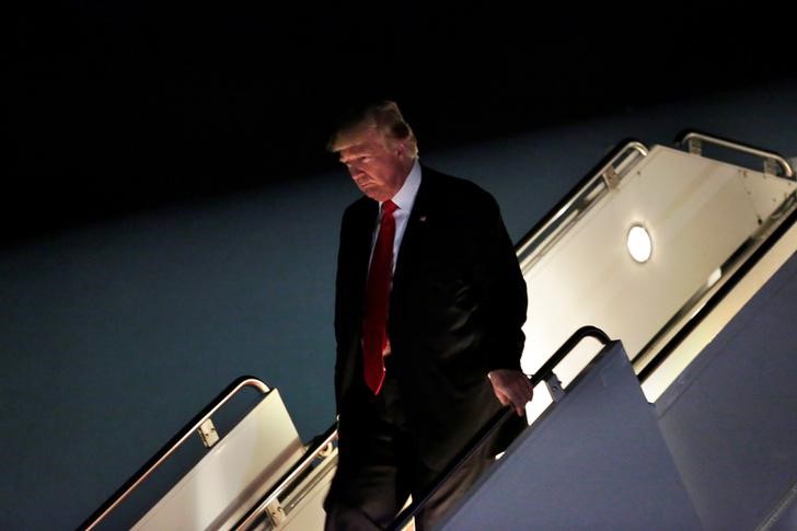 © Reuters. President Donald Trump arrives at Morristown municipal airport