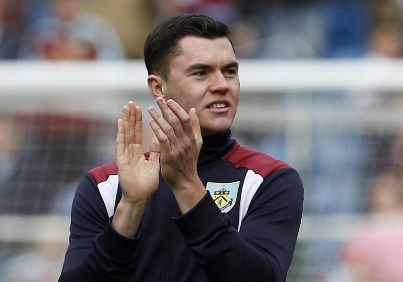 © Reuters. Burnley's Michael Keane applauds fans after the match