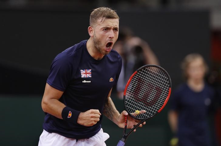 © Reuters. Great Britain's Dan Evans celebrates during his Quarter Final match against France's Jeremy Chardy