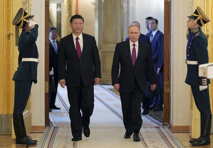 © Reuters. Russian President Vladimir Putin meets with his Chinese counterpart Xi Jinping in Moscow