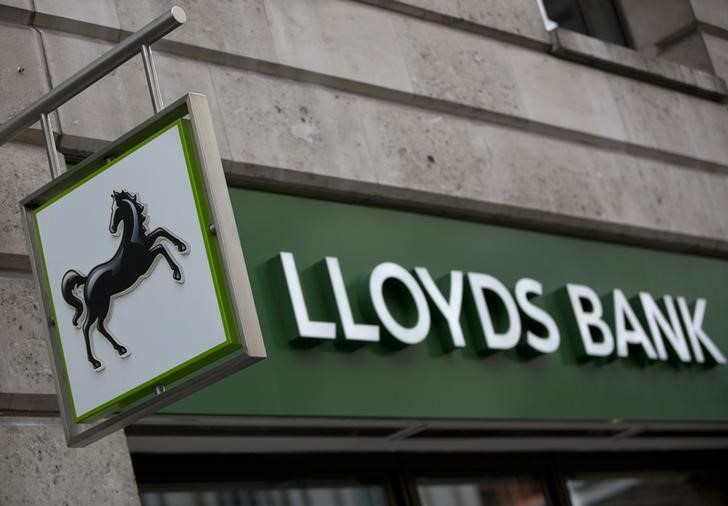 © Reuters. A sign is seen outside a branch of Lloyds Bank in the City London