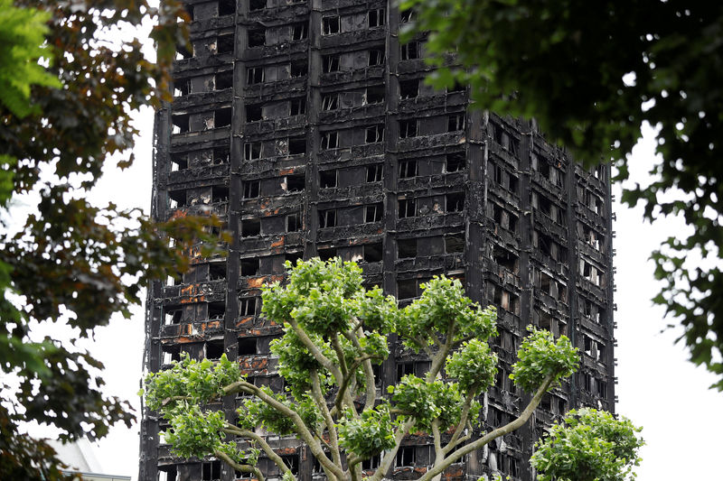 © Reuters. FILE PHOTO: Damage to Grenfell Tower is seen following the fire in London