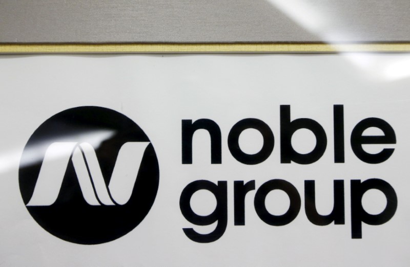 © Reuters. FILE PHOTO: A Noble Group sign is pictured at a meet-the-investors event in Singapore