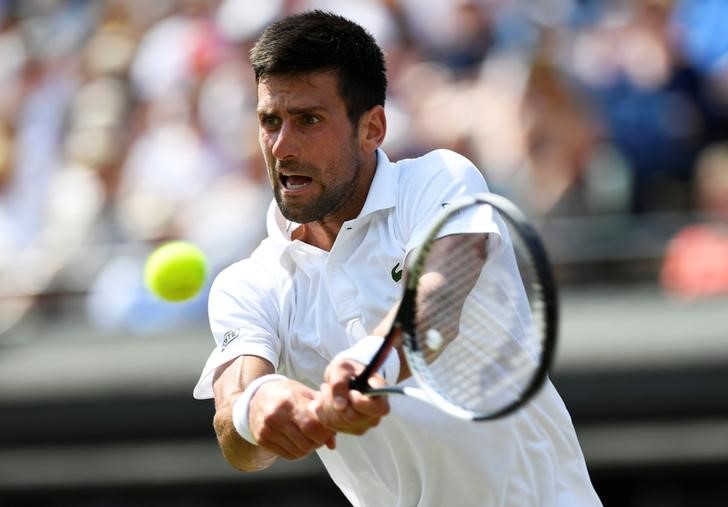 © Reuters. Djokovic avanza a la tercera ronda de Wimbledon, Del Potro queda eliminado