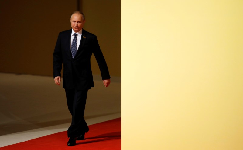 © Reuters. Russia's President Vladimir Putin arrives at the G20 summit in Hamburg