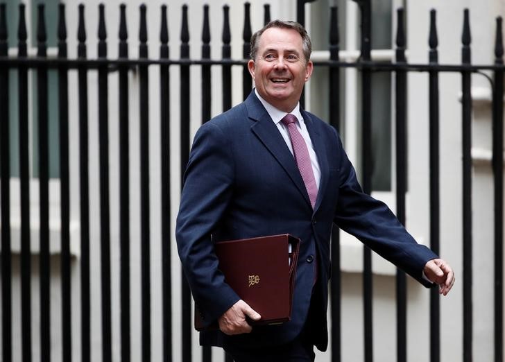 © Reuters. Britain's Secretary of State for International Trade, Liam Fox, arrives in Downing Street for a cabinet meeting, in central London