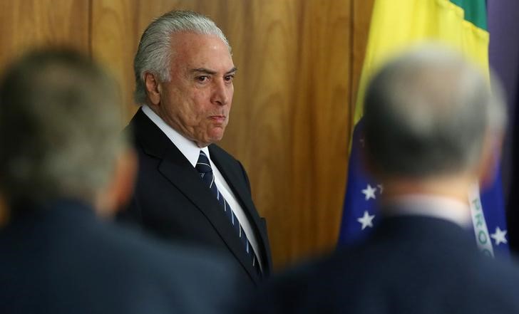 © Reuters. Presidente Michel Temer chega para cerimônia  no Palácio do Planalto, em Brasília