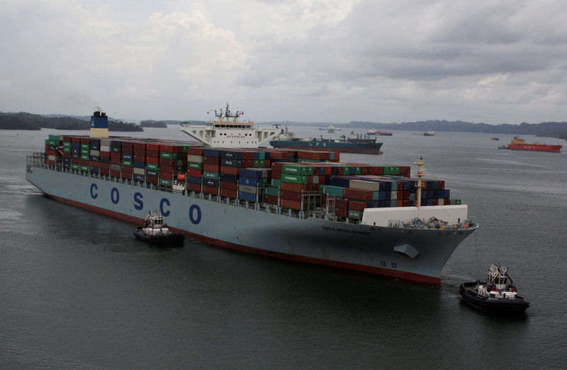 © Reuters. FILE PHOTO: The container ship COSCO Development is seen as its became the largest vessel in dimension and capacity to transit the Expanded Panama Canal at Agua Clara locks, on the outskirts of Colon City, Panama