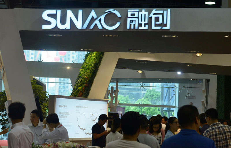 © Reuters. FILE PHOTO: Sunac China Holdings Ltd logo is seen during a exhibition in Hangzhou