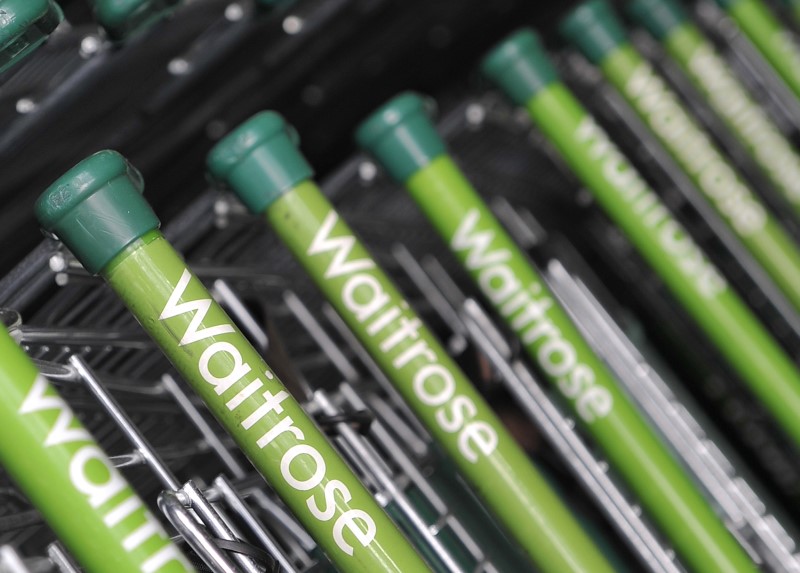 © Reuters. Waitrose shopping carts are seen outside a supermarket in west London