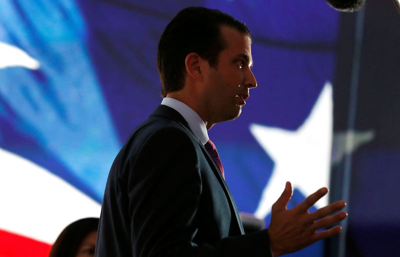 © Reuters. FILE PHOTO: Donald Trump Jr. gives a television interview at the 2016 Republican National Convention in Cleveland