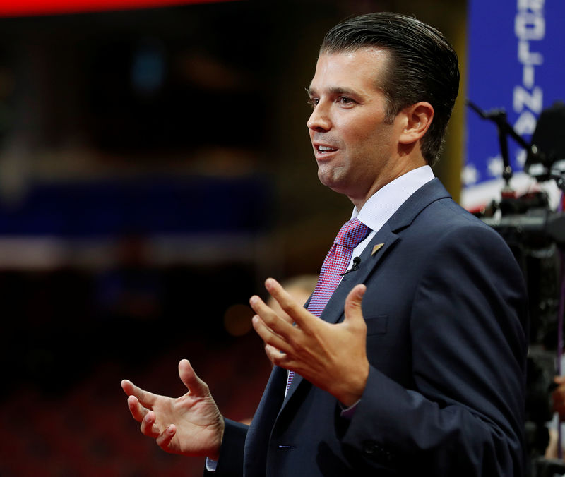 © Reuters. FILE PHOTO: Donald Trump Jr. gives a television interview at the 2016 Republican National Convention in Cleveland