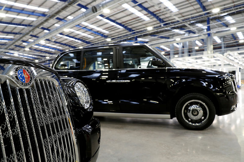 © Reuters. FILE PHOTO: Taxis are displayed at The London Taxi Company's new plant near Coventry