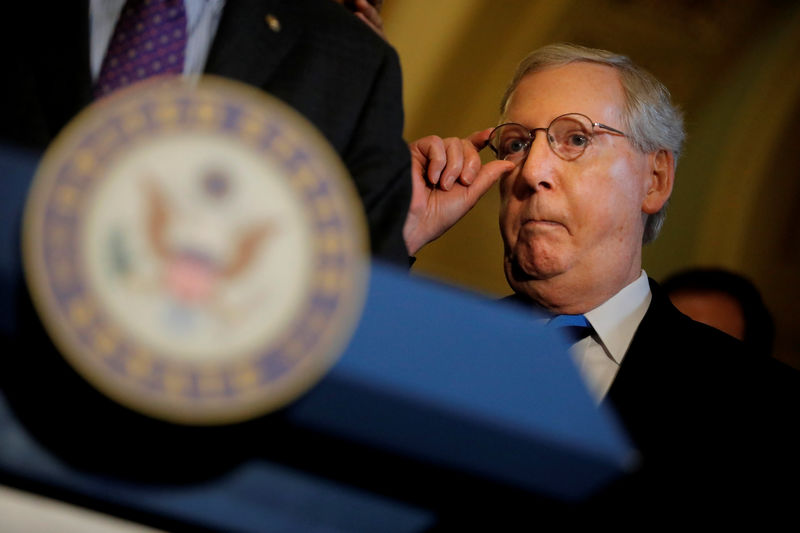 © Reuters. Senate Majority Leader Senator Mitch McConnell (R-KY) attends a new conference following party policy lunch meeting at the U.S. Capitol in Washington, U.S.