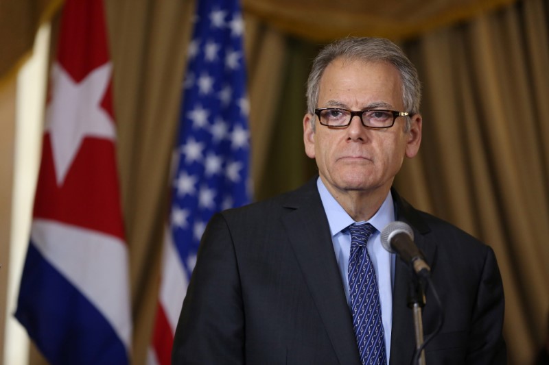 © Reuters. FILE PHOTO: DeLaurentis, U.S. Charge d'Affaires in Cuba, delivers a speech after signing accords with Cuba to join forces to prevent, contain and cleanup oil spills in their respective Gulf of Mexico waters, in Havana