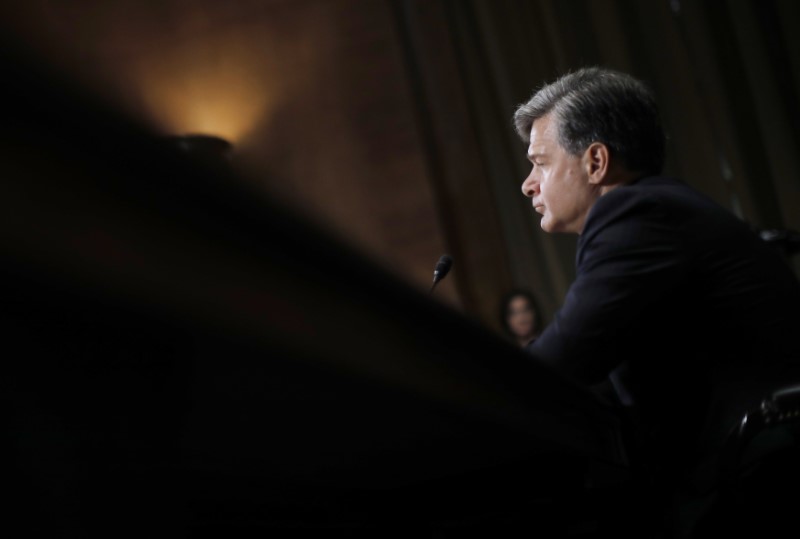 © Reuters. Wray testifies before Senate Judiciary Committee confirmation hearing on Capitol Hill in Washington