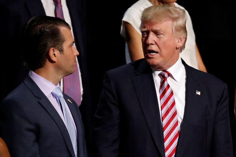 © Reuters. FILE PHOTO: Donald Trump Jr. talks with his father at 2016 Republican National Convention in Cleveland