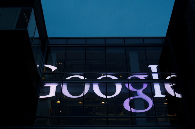 © Reuters. The sign marking the Google offices is lit up in Cambridge