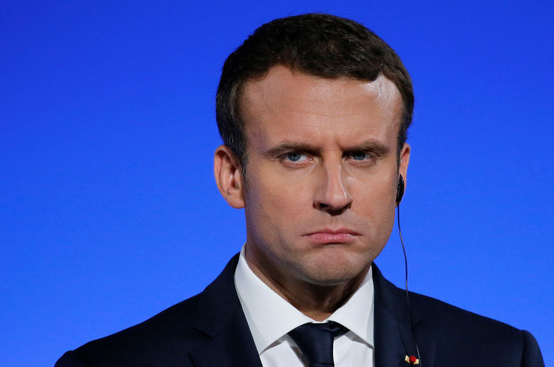 © Reuters. French President Emmanuel Macron attends a news conference following a Franco-German joint cabinet meeting at the Elysee Palace in Paris