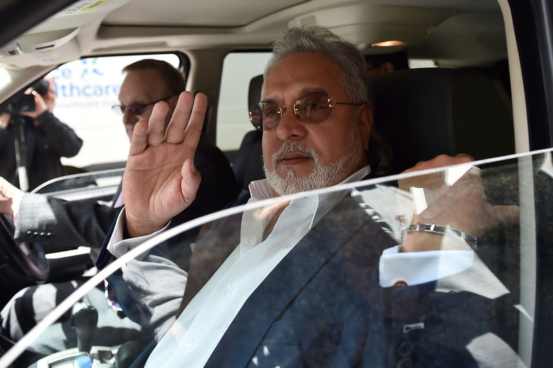 © Reuters. FILE PHOTO: Force India co-owner, Vijay Mallya, leaves after an extradition hearing at Westminster Magistrates Court, in central London