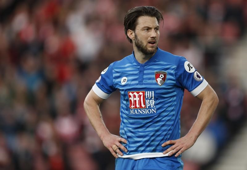 © Reuters. Bournemouth's Harry Arter looks dejected