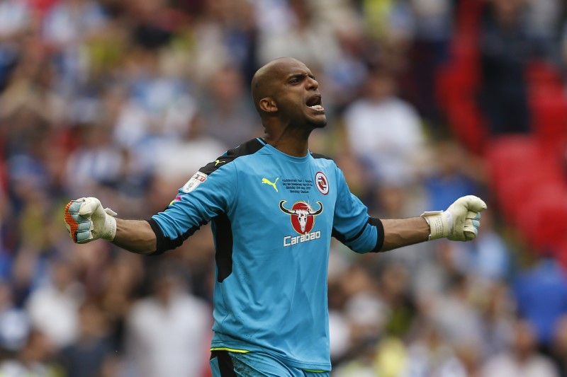 © Reuters. Reading's Ali Al Habsi celebrates after saving a penalty