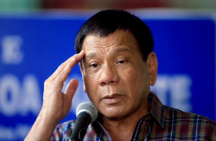 © Reuters. رئيس الفلبين يتعهد بالتعجيل بإقرار تشريع يتيح حكما ذاتيا لمنطقة مسلمة