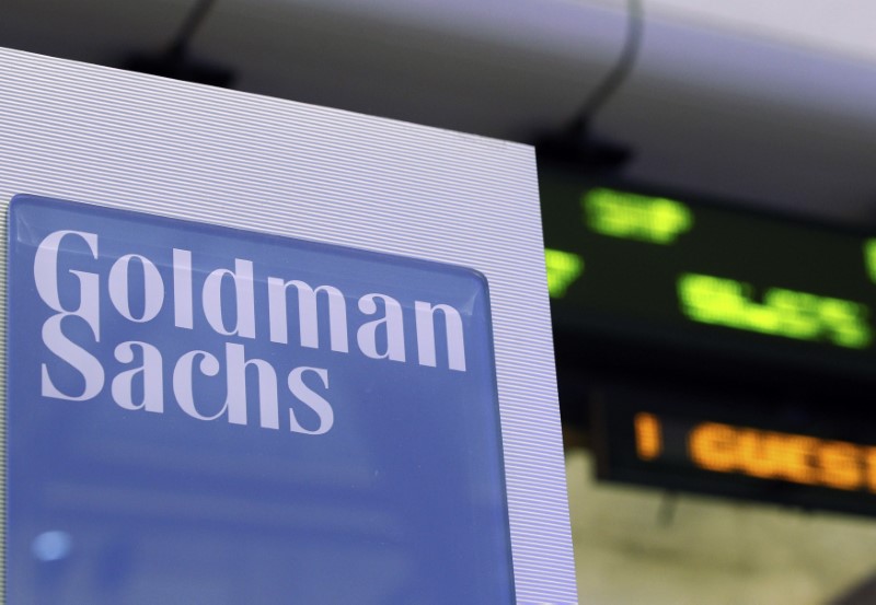 © Reuters. A Goldman Sachs sign is seen on at the company's post on the floor of the New York Stock Exchange