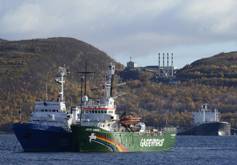 © Reuters. Greenpeace ship "Arctic Sunrise" is seen anchored outside the Arctic port city of Murmansk