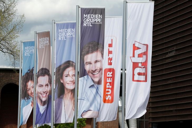 © Reuters. Flags with the logo of the RTL Media Group, Europe's leading entertainment company and their German TV stations N-TV and Super-RTL flutter in the wind at RTL's German headquarters in Cologne
