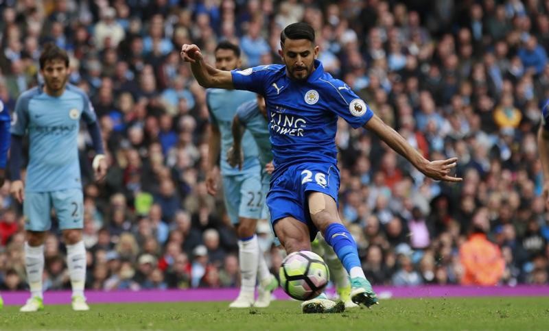 © Reuters. Leicester City's Riyad Mahrez scores from the penalty spot but it is disallowed for kicking the ball twice