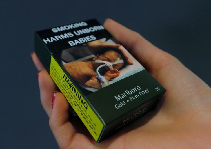 © Reuters. A packet of Marlboro cigarettes made by Philip Morris are pictured in this photo illustration