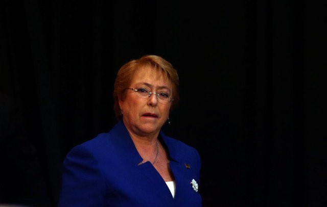 © Reuters. Chile's President Michelle Bachelet arrives for a working session at the Mercosur trade bloc summit in Mendoza