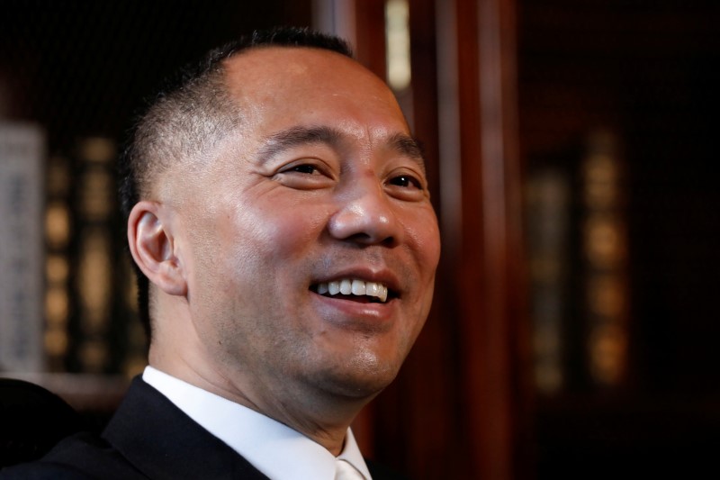 © Reuters. FILE PHOTO - Billionaire businessman Guo Wengui speaks during an interview in New York