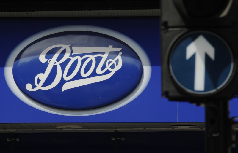 © Reuters. FILE PHOTO - A sign outside a store of pharmacy and cosmetics chain Boots is seen in London