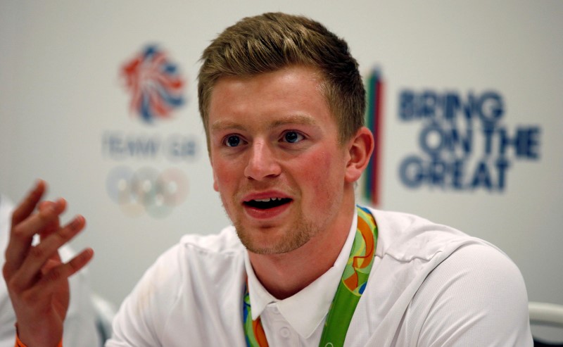 © Reuters. Team GB athlete Adam Peaty speaks at a news conference after returning from the 2016 Rio Olympics, at Heathrow Airport in London