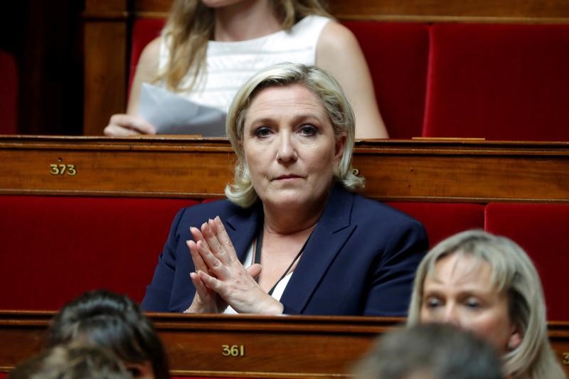 © Reuters. Newly-elected member of parliament Marine Le Pen of France's far-right National Front (FN) political party attends the opening session of the French National Assembly in Paris