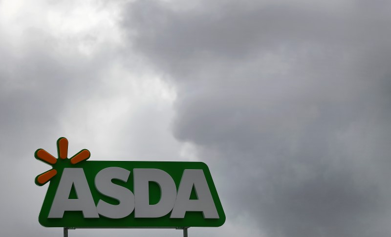 © Reuters. FILE PHOTO:  A company logo is pictured outside an ASDA supermarket near Manchester