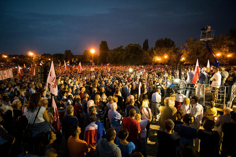 © Reuters. People gather during a protest against the Supreme Court legislation in Poznan