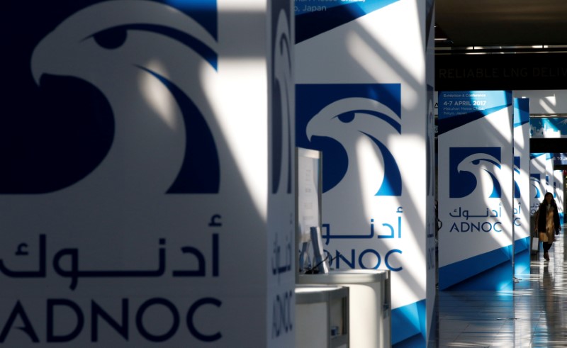 © Reuters. FILE PHOTO: Logos of ADNOC are seen at Gastech, the world's biggest expo for the gas industry, in Chiba