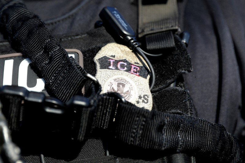 © Reuters. FILE PHOTO: The badge of a U.S. Immigration and Customs Enforcement's (ICE) Fugitive Operations team is seen in Santa Ana