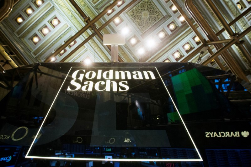 © Reuters. FILE PHOTO - Goldman Sachs sign is seen above floor of the New York Stock Exchange shortly after the opening bell in the Manhattan borough of New York