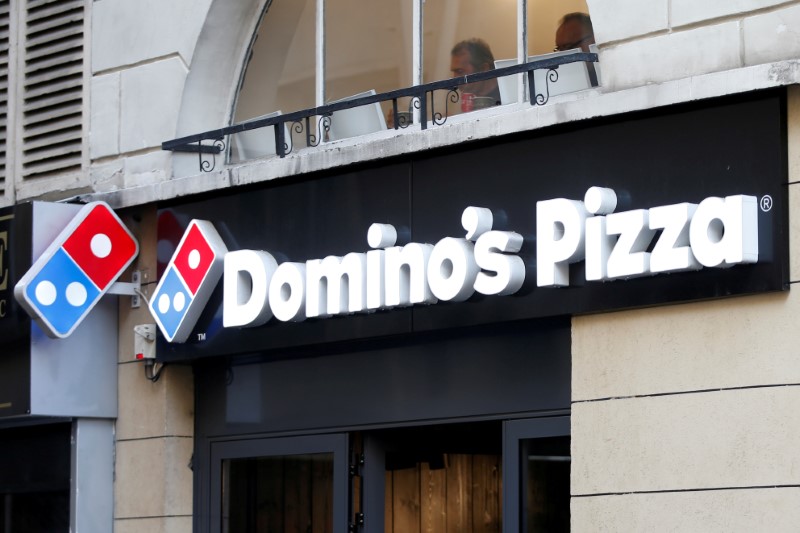 © Reuters. FILE PHOTO: The sign of a Domino's Pizza restaurant is seen in Paris