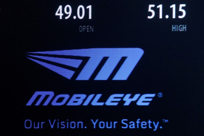 © Reuters. FILE PHOTO:A logo and stock price information for automotive industry supplier Mobileye NV is displayed on a screen where the stock is traded on the floor of the NYSE