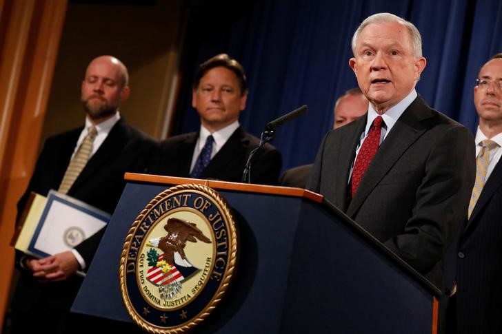 © Reuters. U.S. Attorney General Jeff Sessions speaks during a news conference announcing the takedown of the dark web marketplace AlphaBay, at the Justice Department in Washington