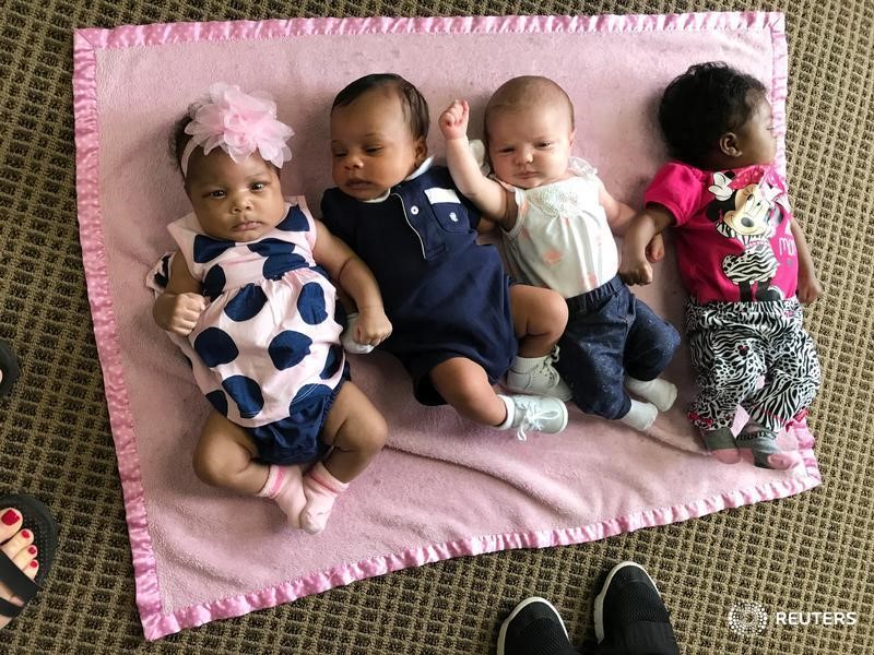 © Reuters. Babies during a group session for their mothers in Bay Minette