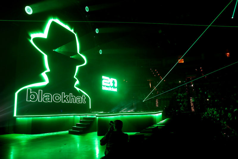 © Reuters. The Black Hat logo is displayed before a keynote address during the Black Hat information security conference in Las Vegas