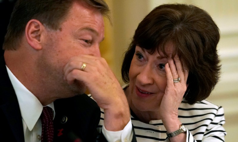 © Reuters. Heller and Collins speak at Trump meeting with Senate Republicans at the White House in Washington