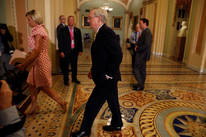 © Reuters. Senate Majority Leader Mitch McConnell walks to the Senate floor ahead of today's vote on the health care bill on Capitol Hill in Washington