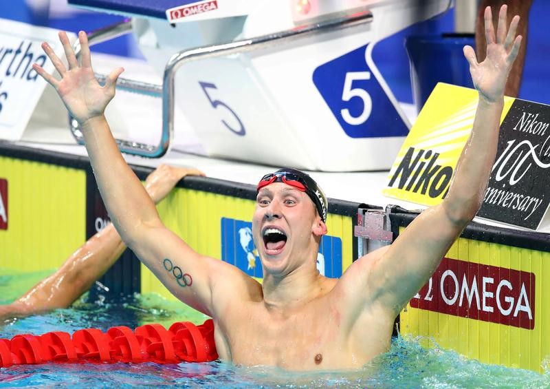 © Reuters. كيليش ودريسل يتألقان في ليلة لا تنسى للفريق الأمريكي ببطولة العالم للسباحة